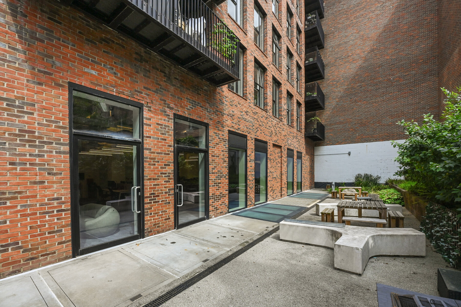 Planted external courtyard beside the commercial units